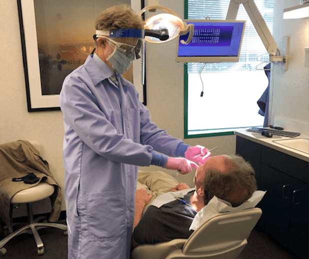 Doctor Strom treating dental patient